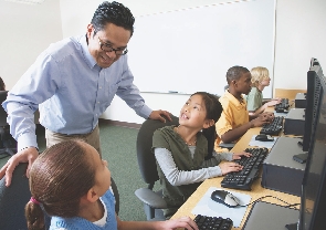 This teacher greets the students.