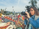 Photograph of a photographer at an outdoor event