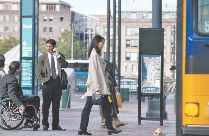 People use the bus in cities around the world.