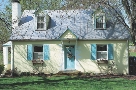 Photograph of a small house (a cottage)