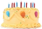 Photograph of a birthday cake with six red candles and four blue candles