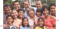 Photograph of an extended family with an arrow pointing to one young member