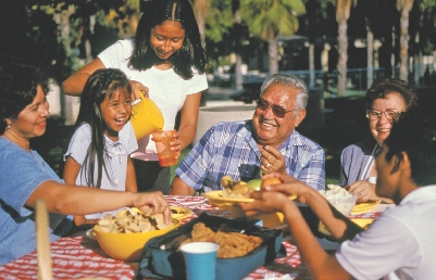 We all eat together at the reunion.