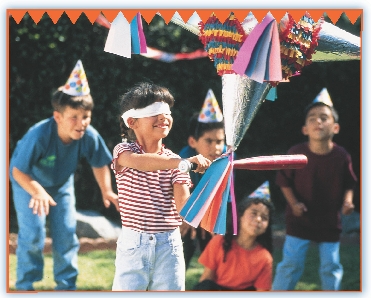 Rosa tries to hit the piñata.