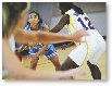 Photograph of girls playing basketball at a basketball game