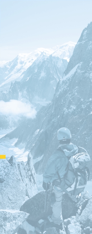 Photograph of the theme book, “Explore!” Background photo: a mountain climber atop a mountain