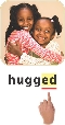 Photograph of two girls hugging. Below is the word “hugged” with a finger pointed to underlined “ed.”