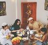 Photograph of a Palestinian family eating together