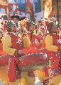 Photograph of several drummers in a marching band