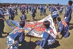 Photograph of a team with their kite at the Japanese Kite Festival