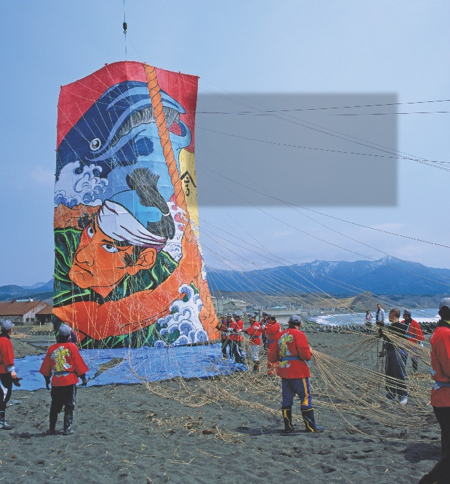 Photograph of a team with a large kite at the Kite Festival in Japan