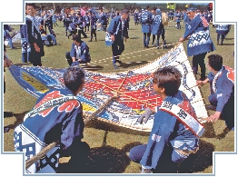 Teams get ready to fly their kites.