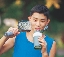 Photograph of a runner drinking water