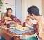 Photograph of two teens eating lunch