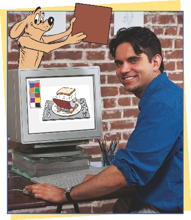 photograph of artist at computer adding color to the illustration of the cartoon sandwich