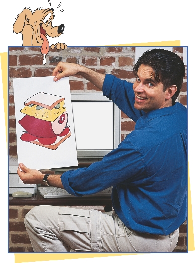 photograph of artist holding completed color picture of cartoon sandwich