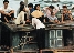 photograph of a Vietnamese family on their boat