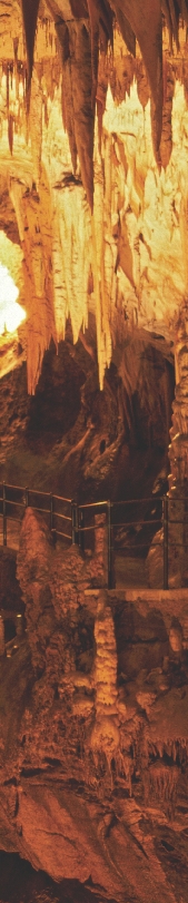 Photograph of stalactites and stalagmites in a cave