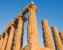 Photograph of tall columns of a very old temple