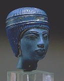 This Egyptian statue is made of pressed glass.