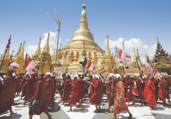 Photograph of a protest march on a street in Myanmar