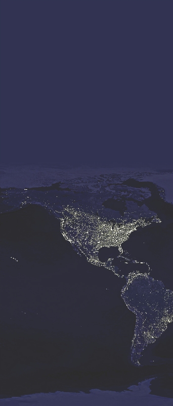 Photograph of Earth's continents as seen from space with city lights visible