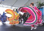 Mexican dancers and musicians perform at a concert in Hawaii.