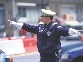 Photograph of a police officer directing traffic